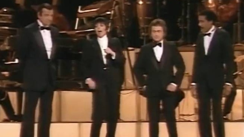 Liza Minnelli, Walter Matthau, Dudley Moore, and Richard Pryor singing at the 1983 Oscars