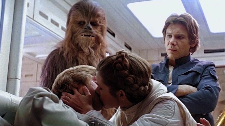 Peter Mayhew, Mark Hamill, Carrie Fisher, and Harrison Ford in The Empire Strikes Back