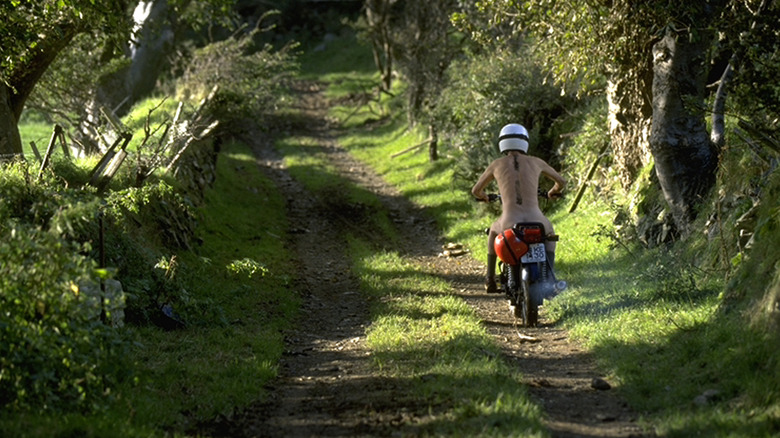 Michael O'Sullivan (David Kelly) rides a motorcycle in Waking Ned Devine