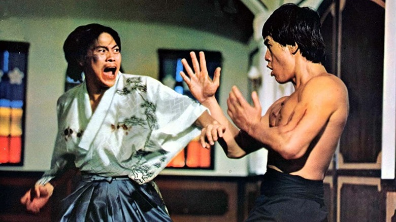 Bruce Lee taking on a fight in Fist of Fury 