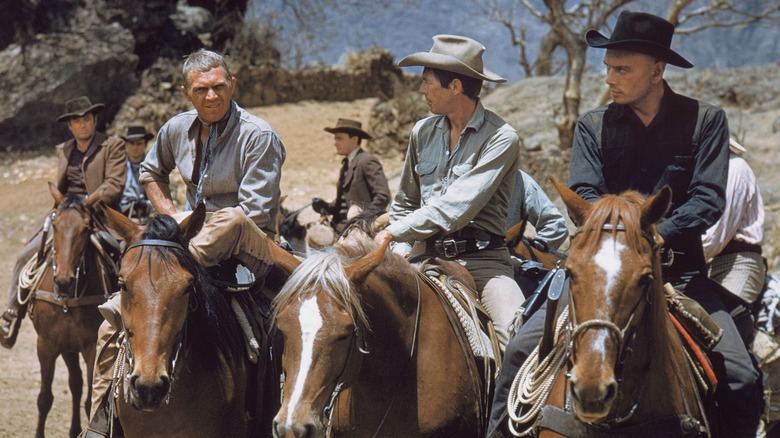 Yul Brynner and the cast of The Magnificent Seven ride horses