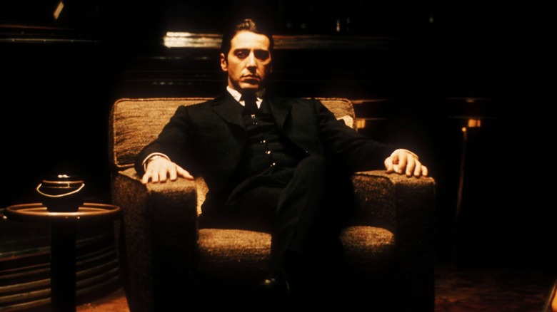 Al Pacino sitting with menace
