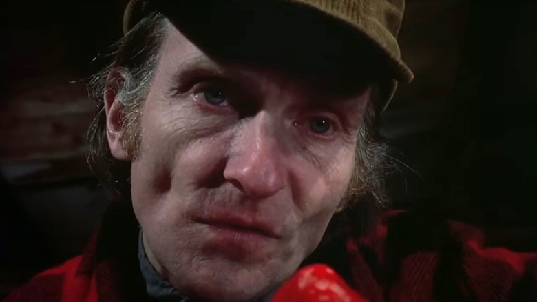 Roberts Blossom as Ezra Cobb staring menacingly in Deranged