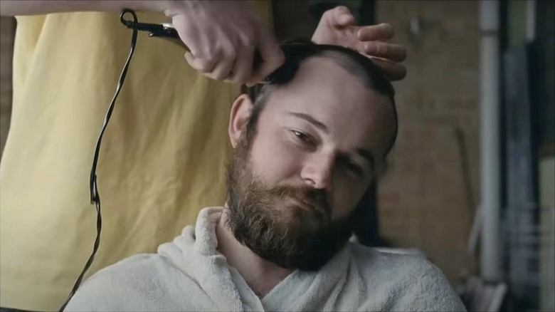 Daniel Henshall as John Bunting gets a haircut in The Snowtown Murders