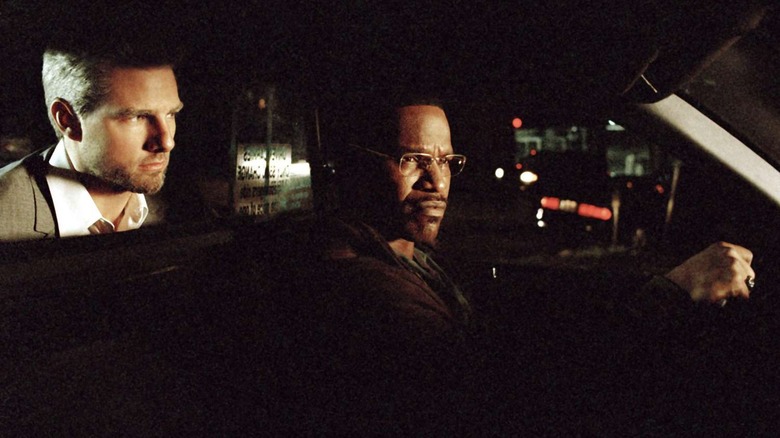 Max driving a cab with Vincent in the backseat in Collateral