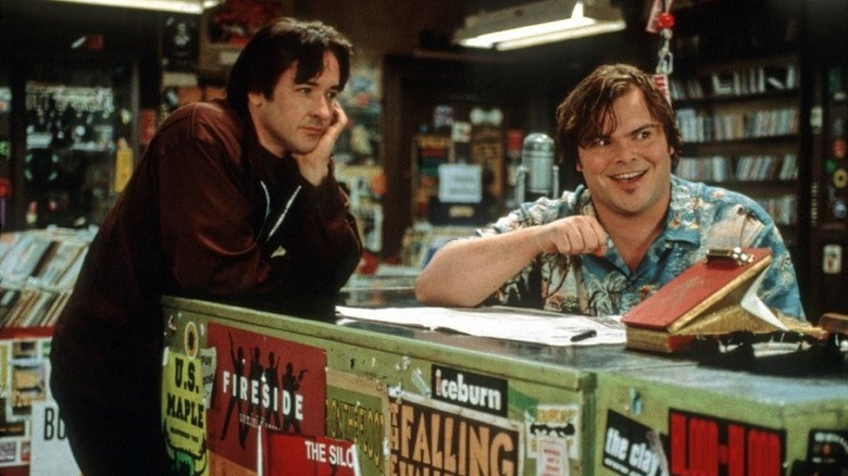 Rob looks at Barry in the record store in High Fidelity