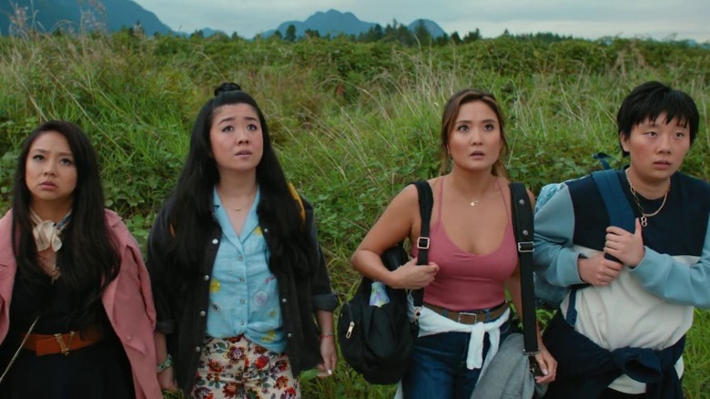 Kat, Lolo, Audrey, and Deadeye standing side by side in front of grasses in Joy Ride