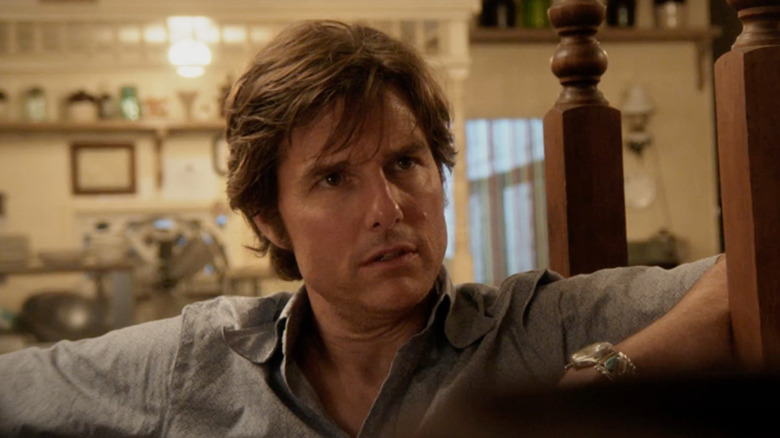 Tom Cruise as Barry Seal looks concerned in American Made