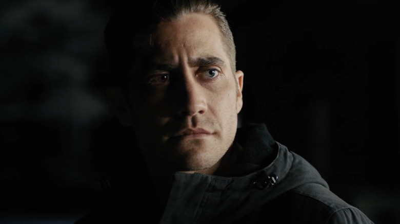 Jake Gyllenhaal as Detective Loki looks concerned in Prisoners