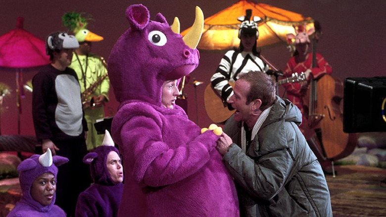 Rainbow Randolph shouting at Smoochy with an adoring crowd of child fans in Death To Smoochy (2002)