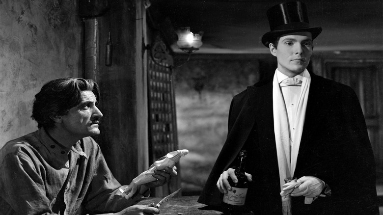 Dorian Gray and a jewel merchant in The Picture of Dorian Gray (1945)