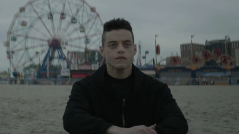 Elliot sitting on beach