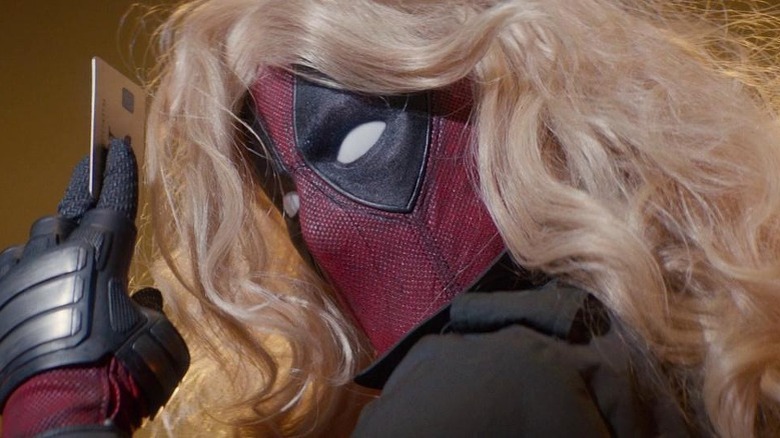 Deadpool wearing long blond wig in Deadpool 2