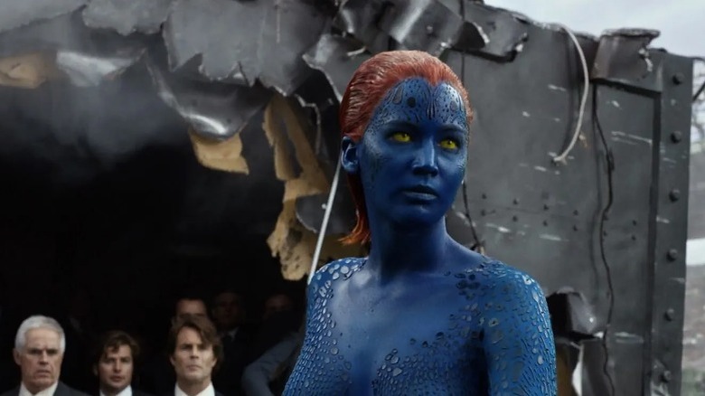 Mystique standing in front of politicians amid wreckage in X-Men: Days of Future Past