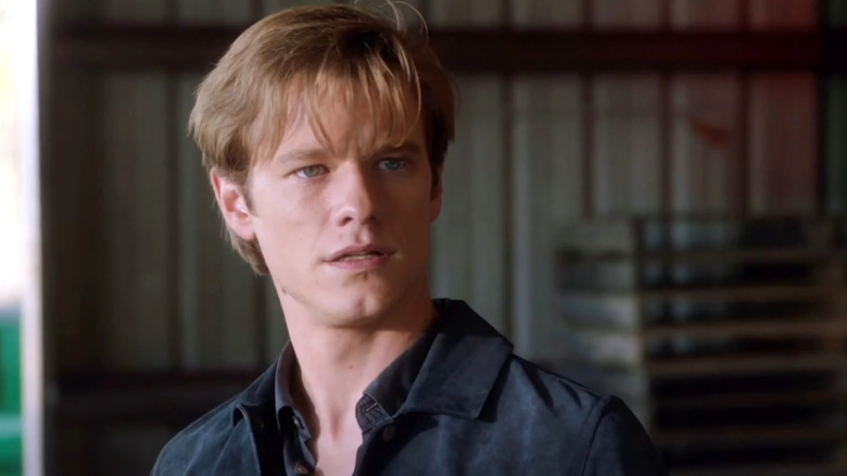 Lucas Till as Angus MacGyver looking to the side in MacGyver (2016)