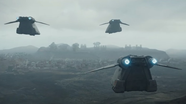 gunships flying foggy planet