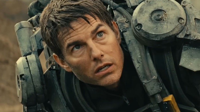 Cage in his combat suit, looking up in fear in Edge of Tomorrow