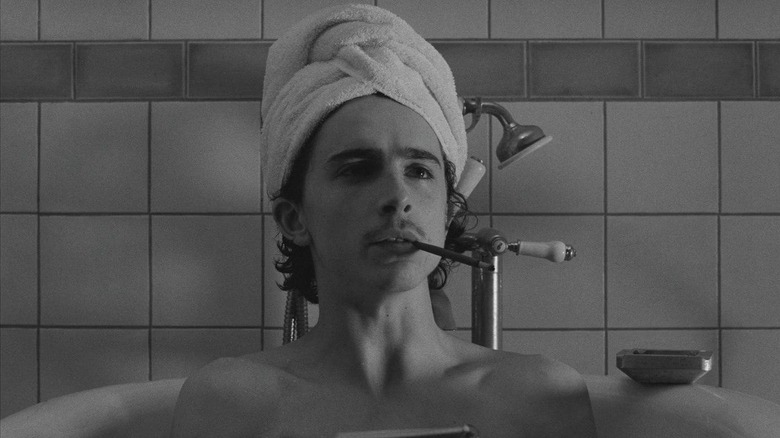 Timothée Chalamet smokes in bathtub The French Dispatch