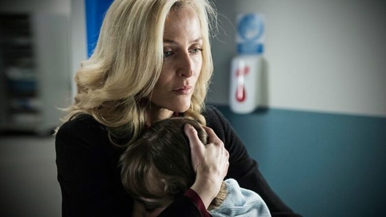 The Fall Stella Gibson hugs a girl