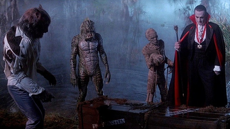 Dracula in a swamp with the wolfman, gillman and mummy.