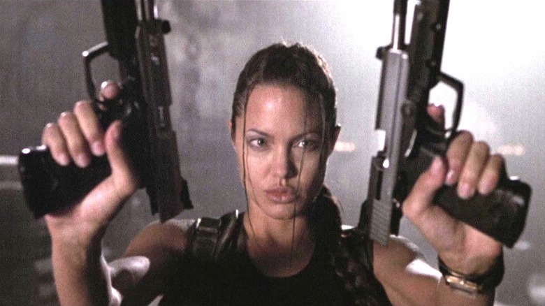 Lara Croft holding two pistols