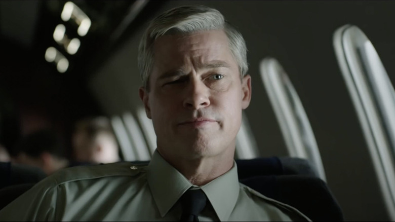 Brad Pitt in War Machine on a plane
