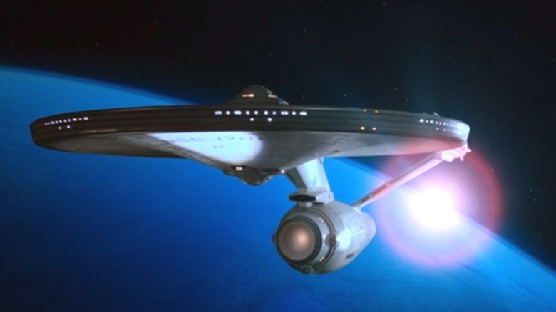 The USS Enterprise departs Earth