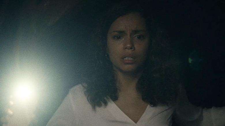 Georgina Campbell with flashlight in Barbarian