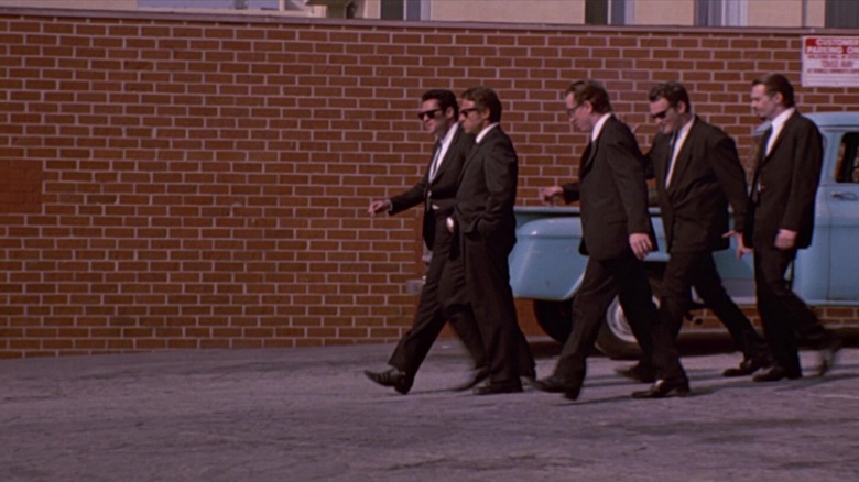 Group of men walking down street