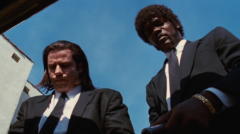 John Travolta and Samuel L. Jackson looking inside trunk