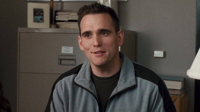 Matt Dillon as John Ryan wearing grey jacket in Crash