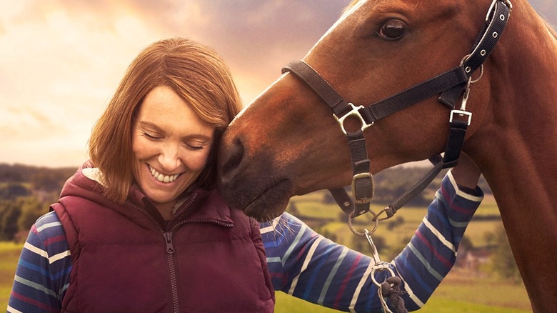 Toni Collete cares for horse