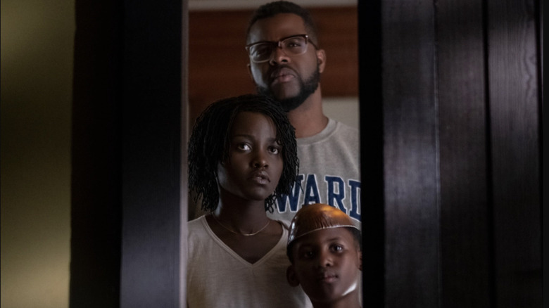 lupita Nyong'o, Winston Duke, and Evan Alex in Us