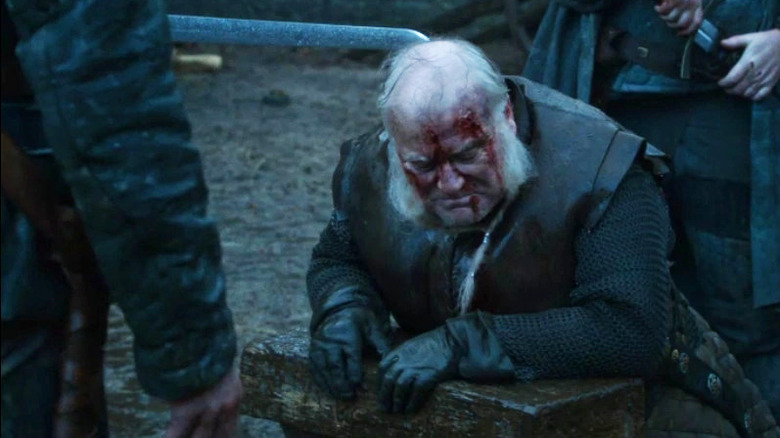 Ron Donachie kneeling bloody Game of Thrones