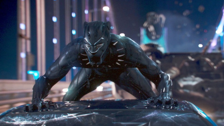 Black Panther riding a car