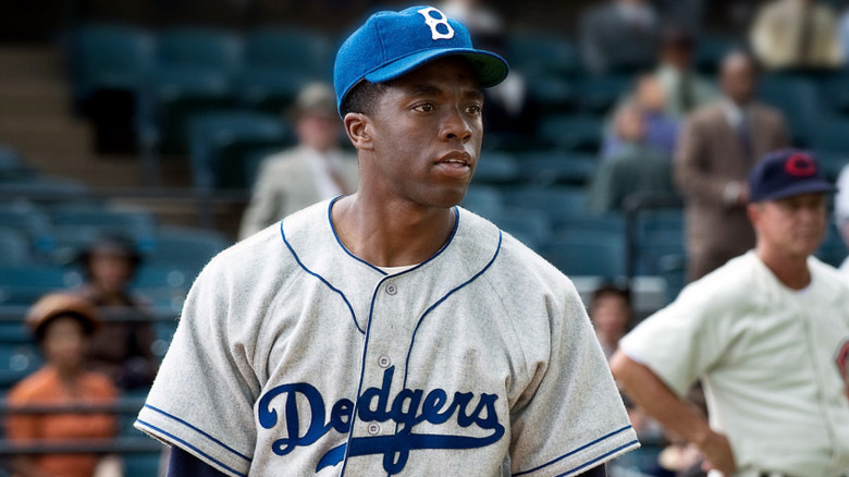 Chadwick Boseman as Jackie Robinson in Dodgers uniform