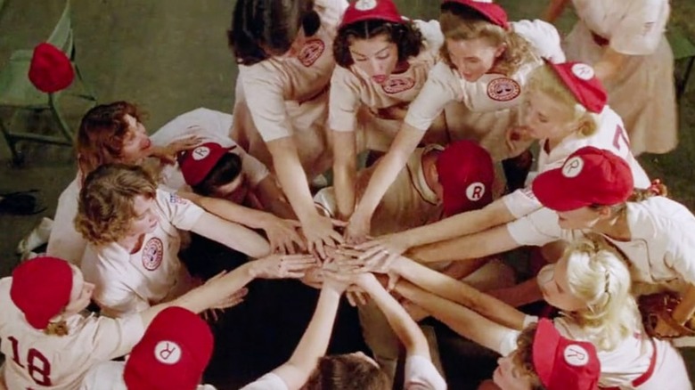 women's baseball team huddles in A League of Their Own