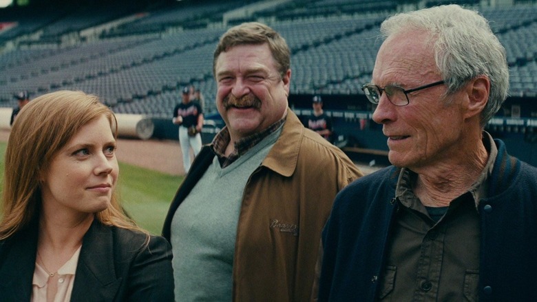 Gus and Mickey smiling on baseball field