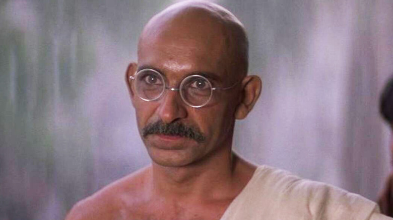 Gandhi wearing robe glasses