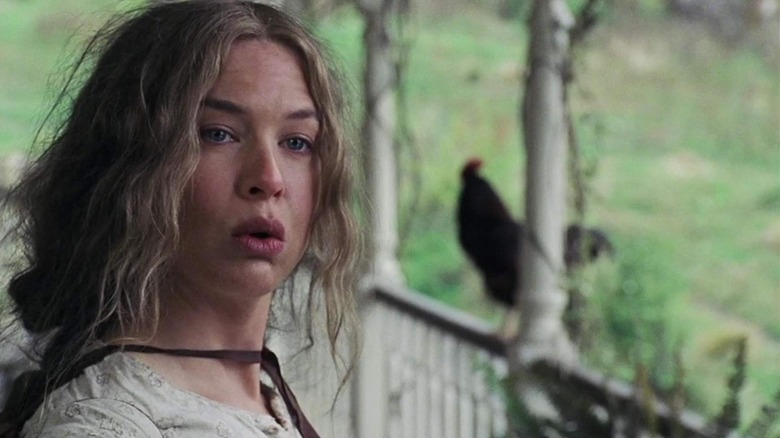 Renee Zellweger looks confused with rooster