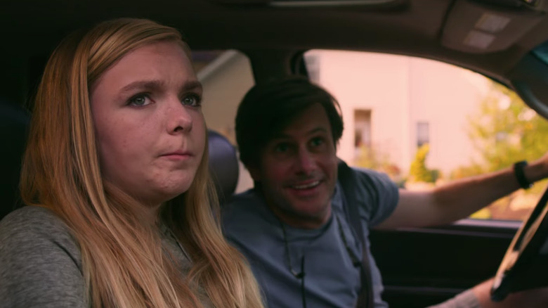 Kayla looks apprehensive as her father drops her off in Eighth Grade