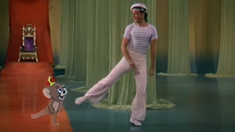 Gene Kelly dancing with cartoon mouse