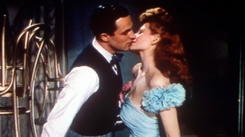 Gene Kelly and Rita Hayworth kissing