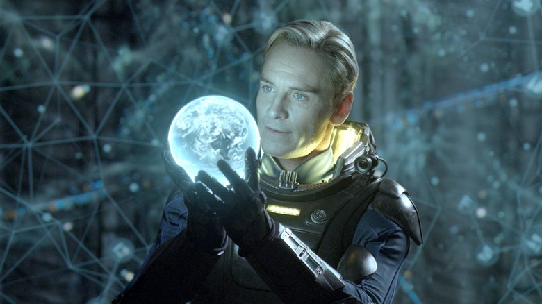 Michael Fassbender holds orb in Prometheus