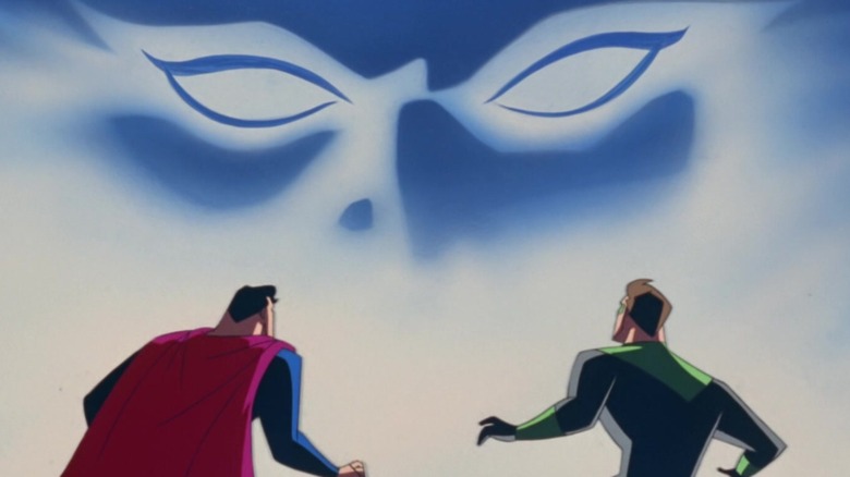 A superior being looks down on Superman and Green Lantern