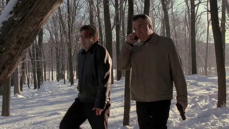 Christopher Moltisanti and Paulie Gaultieri walking in woods