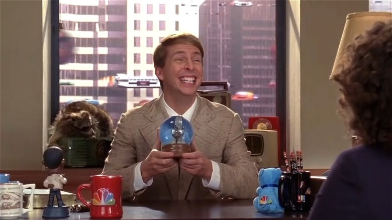 30 Rock Kenneth holds snow globe in the future