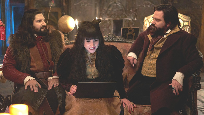 Nandor, Nadja, and Laszlo gather around a laptop