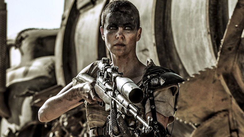 Furiosa aims gun Max Max Fury Road