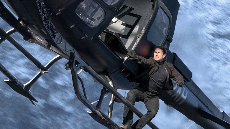 Ethan Hunt hangs from a helicopter